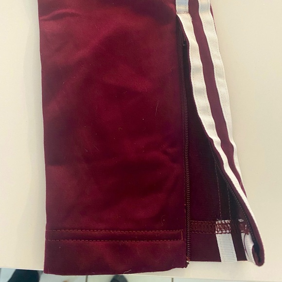 Adidas sports pants with adjustable zipper on bottom of pant. - Picture 3 of 4